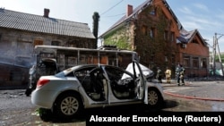 Death In Donetsk: Aftermath Of Shelling In Russian-Occupied Ukrainian City