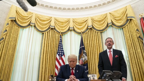 FILE - Pastor Robert Jeffress and President Donald Trump pray after Trump signed a full pardon for Alice Johnson in the Oval Office of the White House, Friday, Aug. 28, 2020, in Washington. Jeffress, pastor of an evangelical megachurch in Dallas, has been a staunch supporter of Trump since his first campaign for president. “Conservative Christians continue to overwhelmingly support Donald Trump because of his biblical policies, not his personal piety,” Jeffress told The Associated Press via email. (AP Photo/Evan Vucci, File)