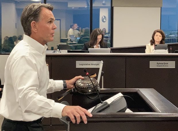 Macomb County Executive Mark Hackel speaks to the county Board of Commissioners on Thursday during the second public- comment agenda item following the board's approval of the $229 million jail project that was approved.(JAMESON COOK -- THE MACOMB DAILY)