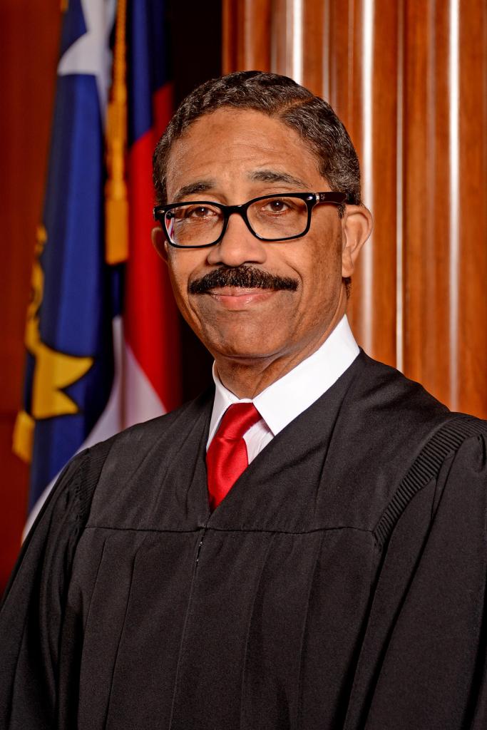 North Carolina Supreme Court Associate Justice Michael Morgan poses in his judicial robe.