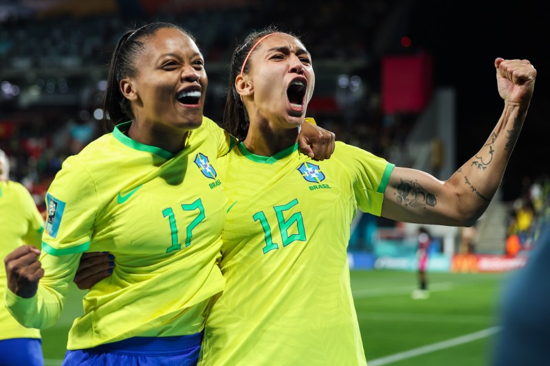 Bia Zaneratto of Brazil celebrates with teammate Ary Borges after scoring her team’s third goal during a match between Brazil and Panama during the FIFA Women’s World Cup in Adelaide, Australia, on July 24.