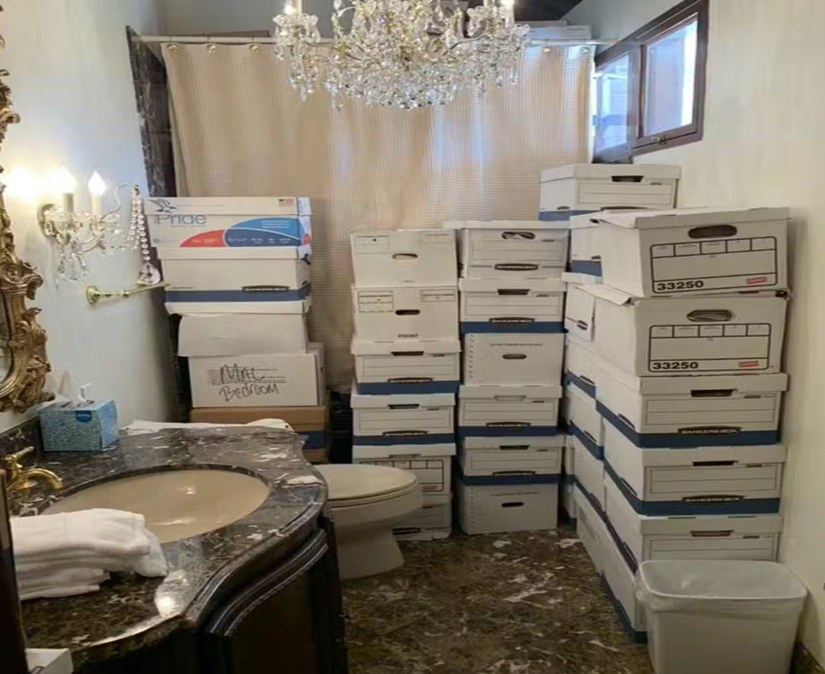 The Trump federal indictment includes this photo of boxes of records stored in a bathroom and shower at Trump’s Mar-a-Lago estate in Palm Beach, Fla. Justice Department via AP