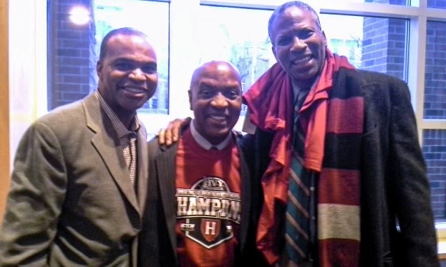 Charles J. Ogletree Jr. poses for a picture with Howard Manly, the former executive editor of the Bay State Banner, and Tommy Amaker.
