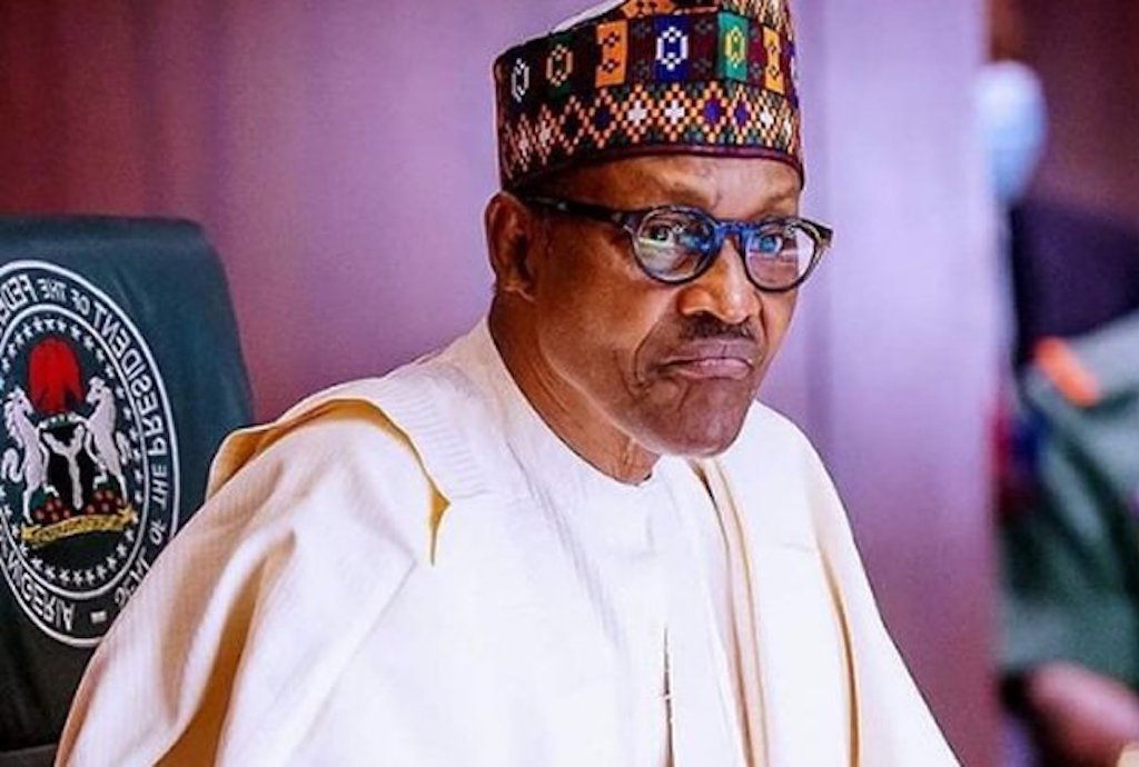 President Muhammadu Buhari (The government says Mr Obasanjo should allow democracy to thrive)