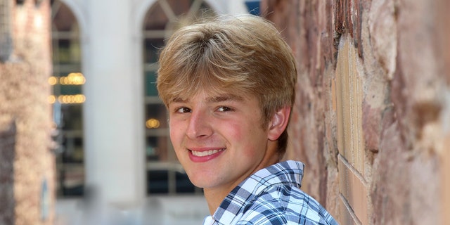 Jordan DeMay smiling in headshot