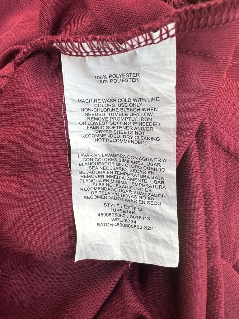 A tag from a polo shirt with an Izod label