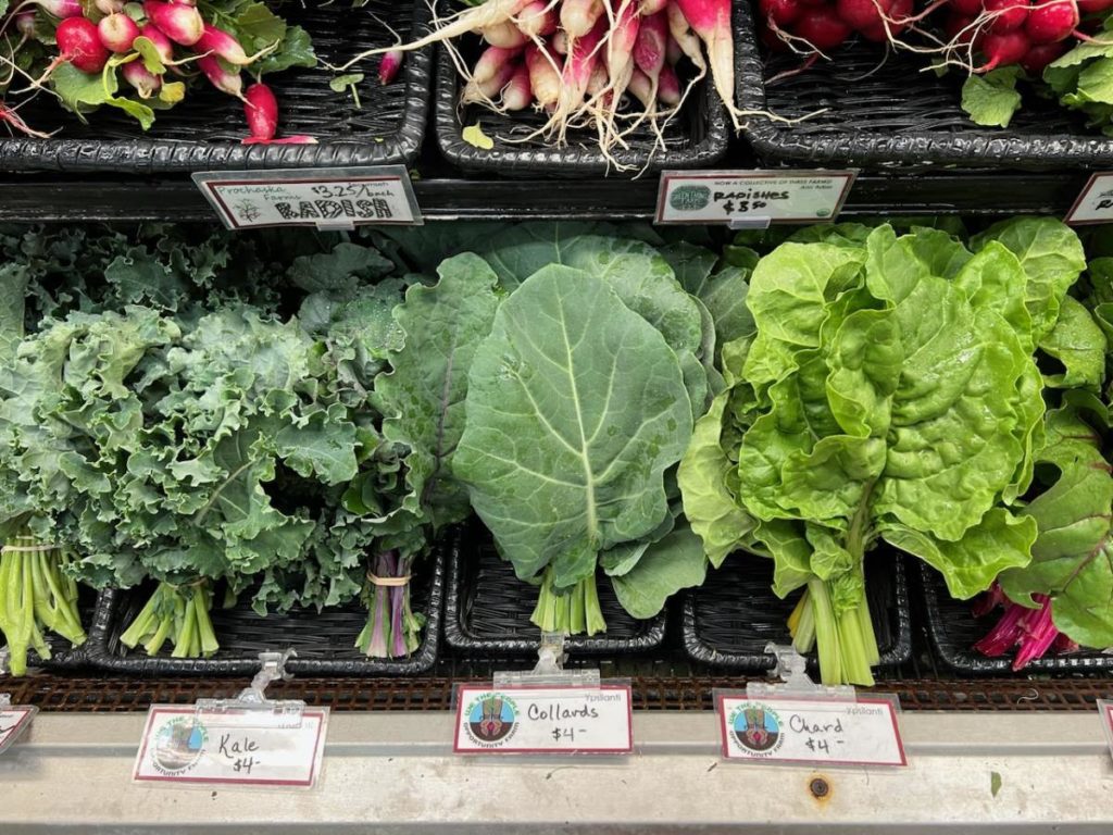 Organic kale, collards, and chard from We the People Opportunity Farm are sold at Argus Farm Stop in Ann Arbor, Michigan, and other area markets and restaurants, part of a program that hires returning citizens. Photo courtesy of We the People Opportunity Farm