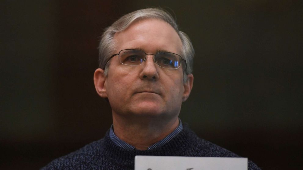 PHOTO: Paul Whelan, a former US marine accused of espionage and arrested in Russia in December 2018, stands inside a defendants' cage as he waits to hear his verdict in Moscow, June 15, 2020.