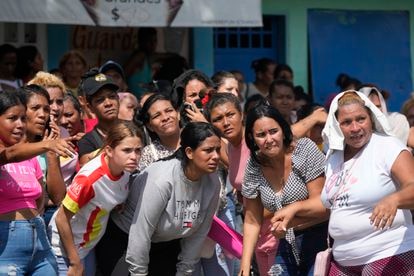 Relatives of prisoners watch the military intervention at Tocorón Penitentiary in Venezuela; September 20, 2023. 