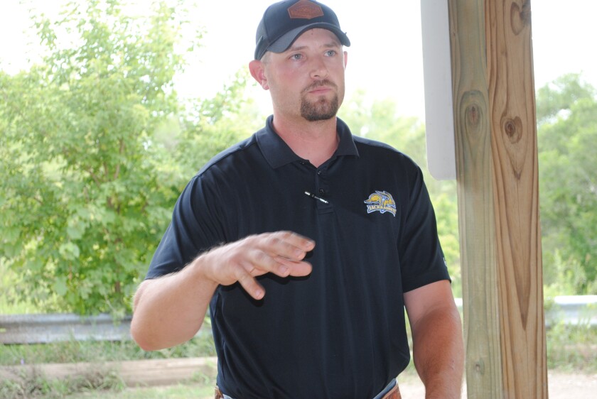 Kody Fossum, director of Swift County parks and drainage, described plans for improvements at the Appleton OHV Park during a July 25, 2023 tour. 