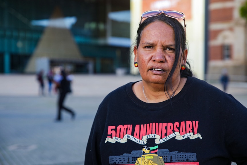 Megan Krakouer wears a shirt marking the 50th anniversary of the tent embassy