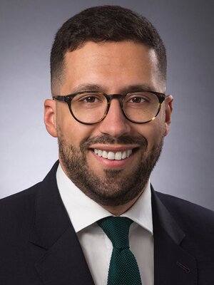 smiling man in suit