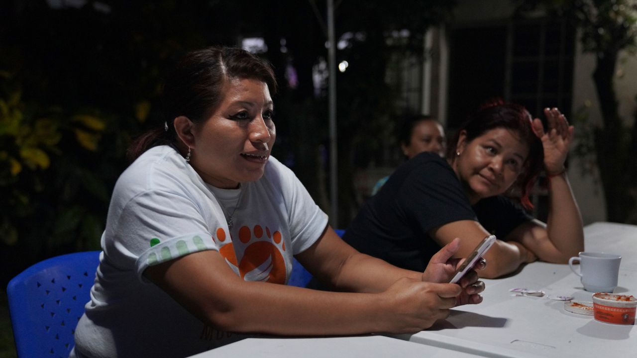 Teodora del Carmen Vásquez sits with friends and fellow members of her organization, Mujeres Libres (Free Women), on Friday, May 20, 2022, in San Salvador, El Salvador. Vásquez, who served 10 years for aggravated homicide after being arrested on suspicion of violating El Salvador's abortion law, started the group Mujeres Libres when she was released in 2018. Her group now fights to free other women and help them transition to new lives. (AP Photo/Jessie Wardarski)