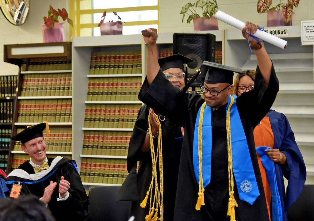 Bradford Bass, who gave the valedictory address, is cheered by the audience at the University of Baltimore’s Second Chance program commencement.