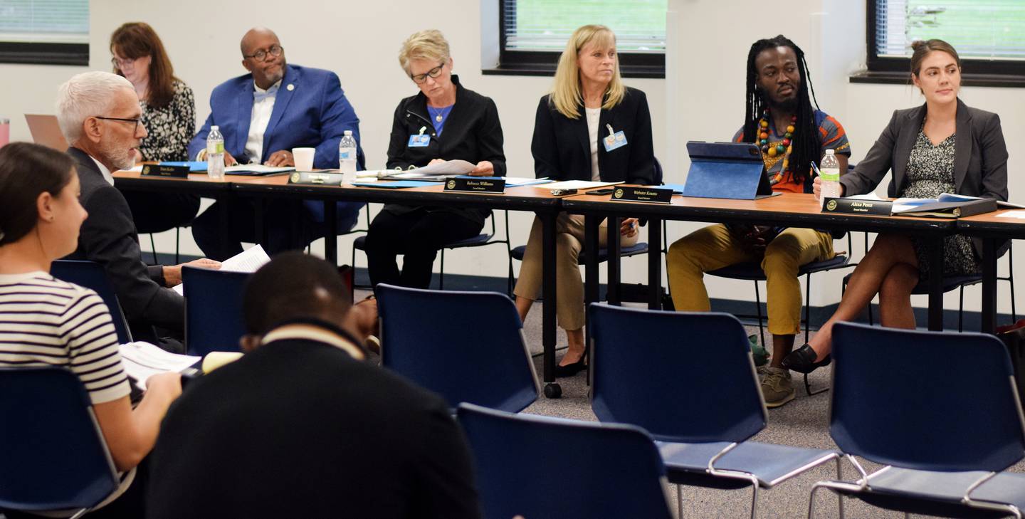 The Iowa Board of Corrections listens to visitors speak during public comment at the Sept. 22 meeting in Des Moines. Visitors who sign in and signify they want to speak get two minutes to speak to the board. Many at the meeting asked questions or shared concerns regarding lack of programming and the alleged unlawful way the multi-disciplinary team and attorney general's office is arbitrarily extending prison time.