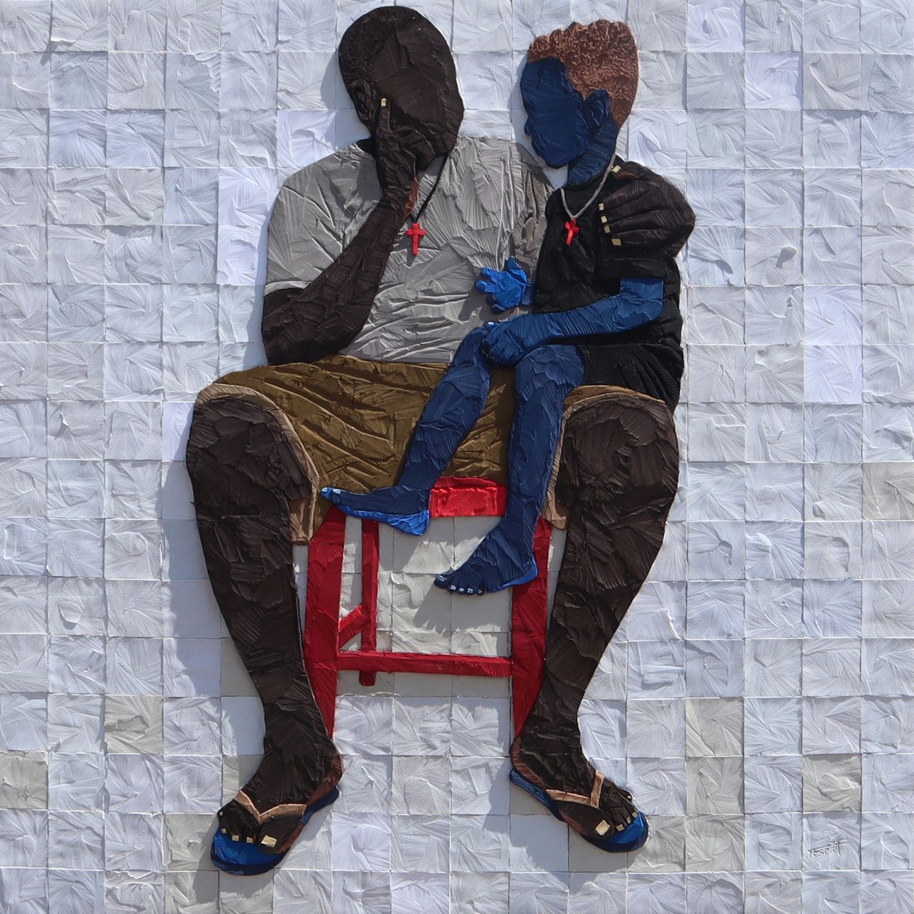 Tesprit worked with the soles of flip flops salvaged from landfill to create a 3D sculpture depicting fatherhood to complement Mr Eazi's song 'Mandela.