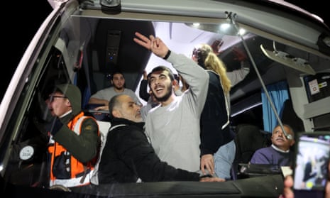 33 Palestinians released from Israeli jails in the 4th batch of prisoners swapRAMALLAH, WEST BANK - NOVEMBER 28: 33 Palestinians, including 3 children and 30 women, released from Israeli jail arrive in Beitunia, Ramallah, West Bank by a bus belonging to the International Committee of the Red Cross (ICRC) on November 28, 2023. (Photo by Issam Rimawi/Anadolu via Getty Images)