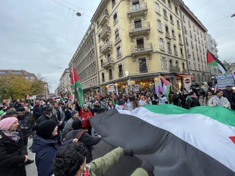 People gather to stage demonstration in solidarity with Palestinians and protest Israeli attacks on Gaza at Parc Des Cropettes Square in Geneva, Switzerland on November 18, 2023. The demonstrators, having set off from Parc Des Cropettes Square, reached the United Nations (UN) Geneva Office to conclude their march.