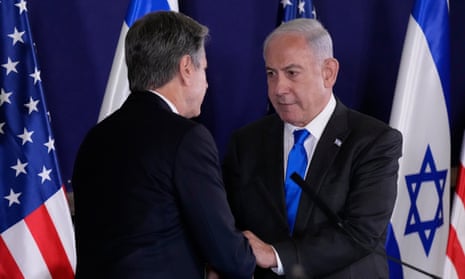 Antony Blinken and Benjamin Netanyahu shake hands in Tel Aviv in October