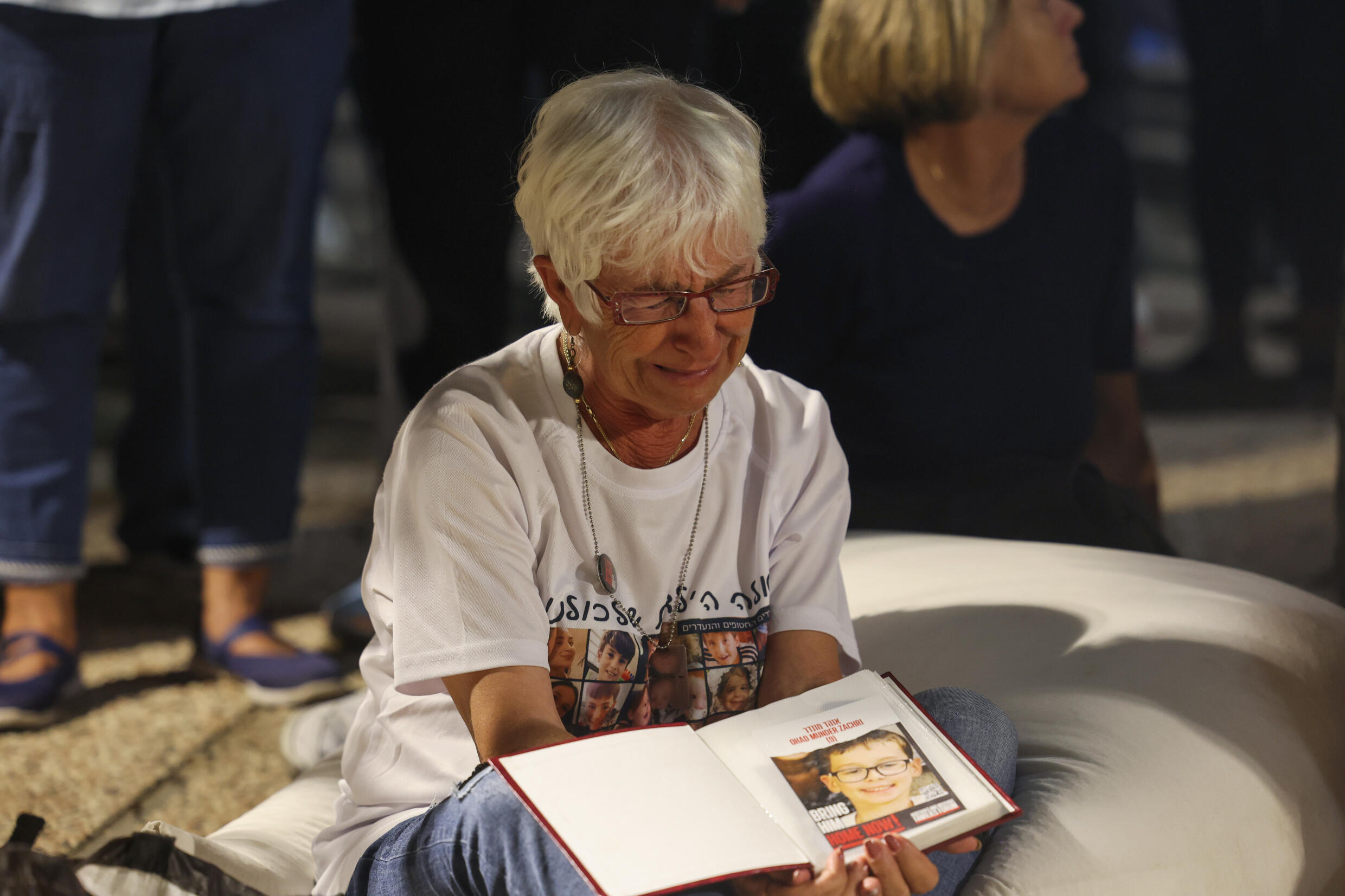 Relatives of Israeli hostages taken by Palestinian militants in the October 7 attack react during a demonstration calling for their release in Tel Aviv on November 13, 2023.