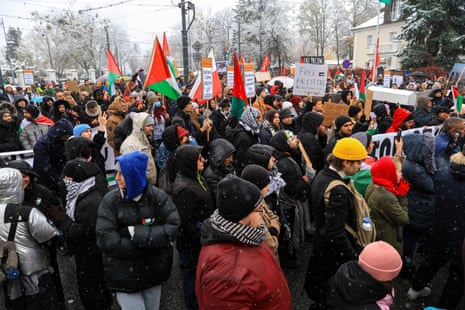 Participants of the pro-Palestinian demonstration rally under the slogan 'Not one more bomb - free Palestine', in front of the Israeli embassy in Warsaw, Poland, 18 November 2023.