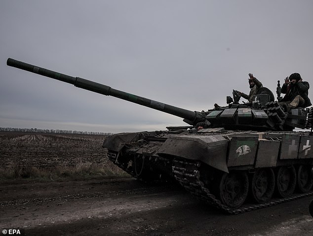 Servicemen of the 68th Separate Jager Infantry Brigade 'Oleksa Dovbush' move in a tank on their frontline position in the Kharkiv region, Ukraine, 08 November 2023