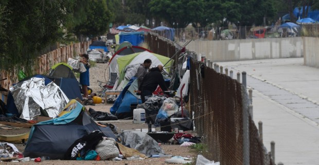 A big homeless encampments line across the wash area across from the Chatsworth Metrolink station Thursday. June 1, 2034.Posts on social media as the 