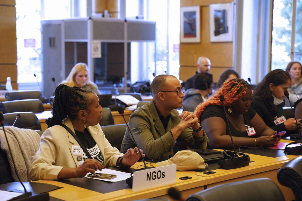 Ms. Patricia, a founding member of the Human Rights Coalition (left); Robert Saleem Holbrook (center); Amistad Law Project Policy Director Nikki Grant (right) at the briefing for the United Nations Human Rights Committee.