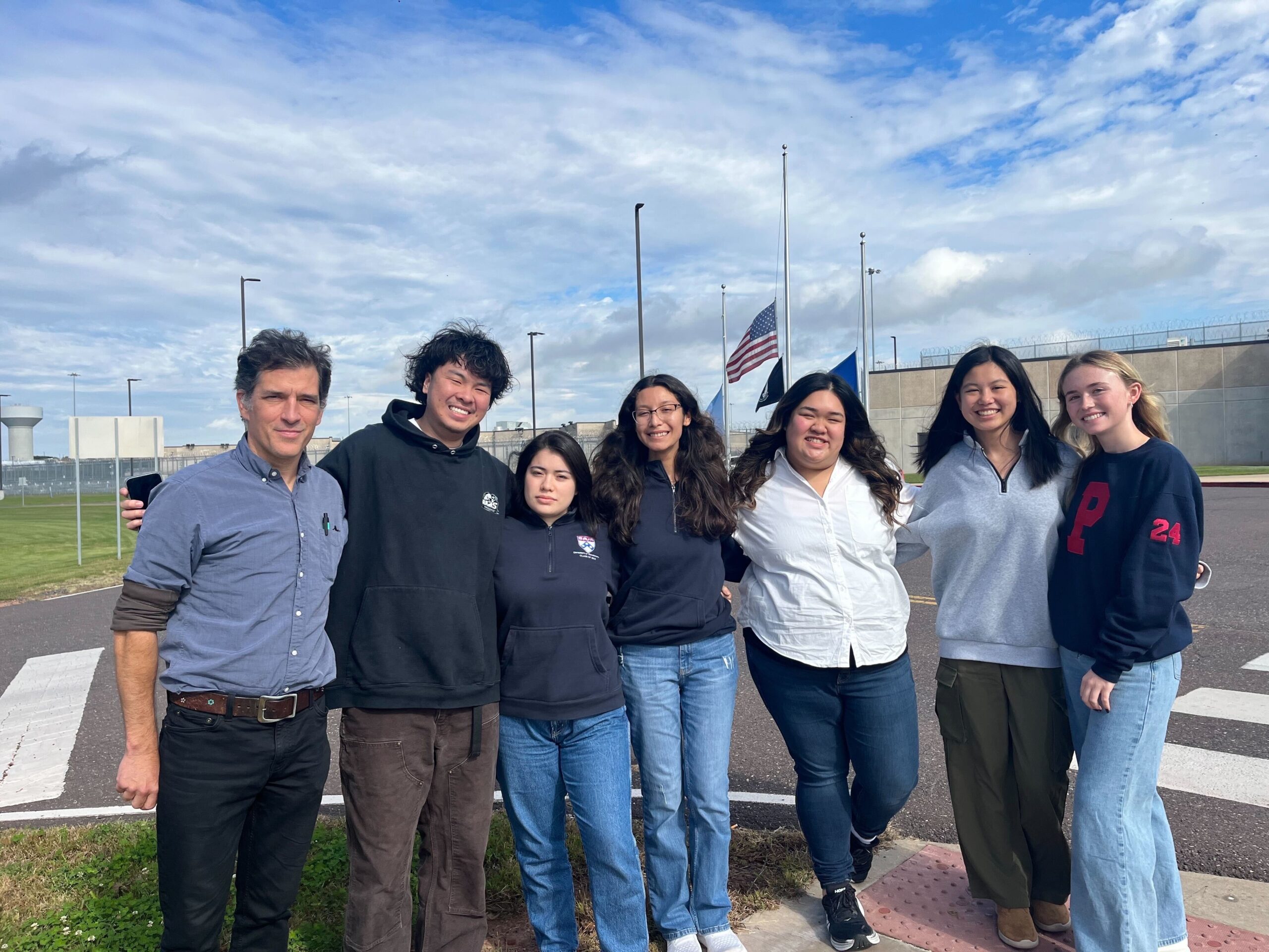 Penn students stand in front of a State Correctional Institution Phoenix, outside Philadelphia.