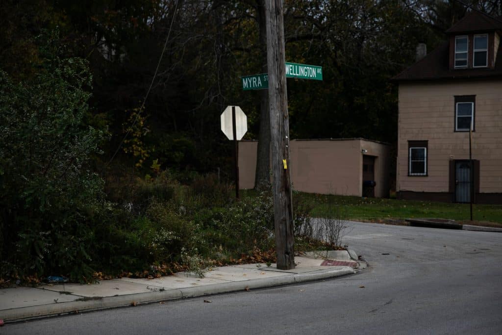 The cross street signs seen at the corner of Wellington Avenue and Myra Street in Akron.