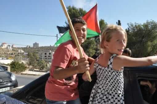 Ahed and her brother in 2011 (Photo: Alison Avigayil Ramer)