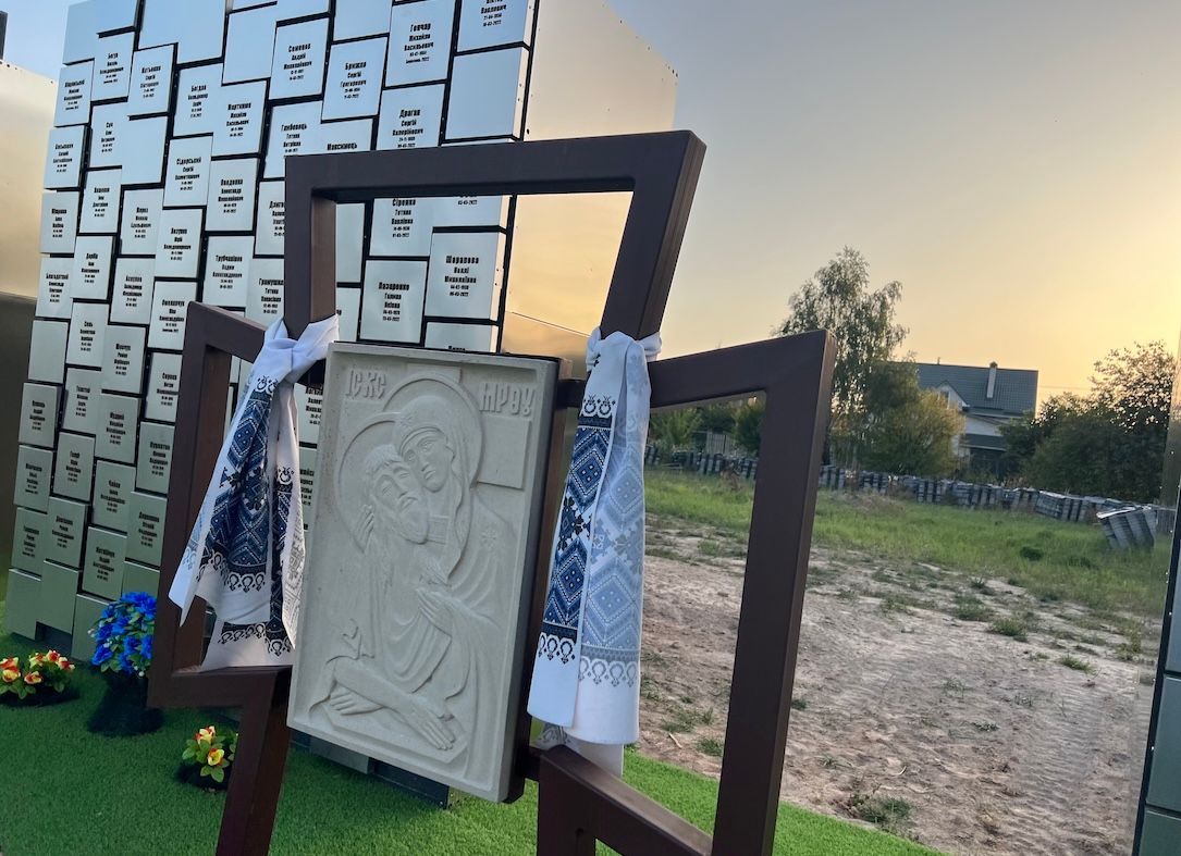 Temporary memorial  at a mass grave near Bucha’s Church of St. Andrew in Ukraine