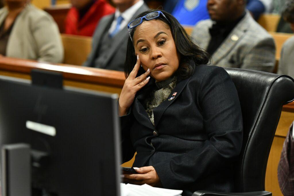 Fulton County District Attorney Fani Willis appears before Judge Scott McAfee for a hearing in the 2020 Georgia election interference case at the Fulton County Courthouse on November 21, 2023 in Atlanta, Georgia.