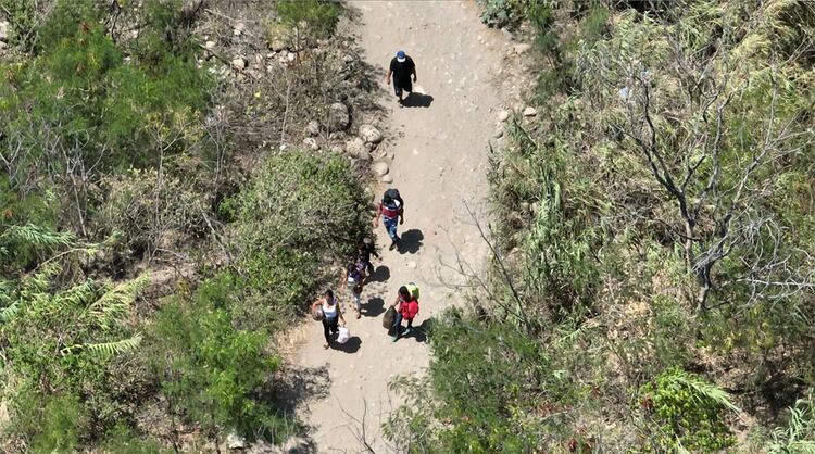 People cross the Venezuela-Colombia border