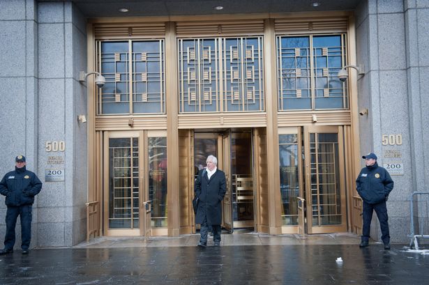 Attorney Sam Schmidt exits the courthouse as his client, British Imam Mostafa Kamel Mostafa, is sentenced to a life term at Manhattan Federal Court