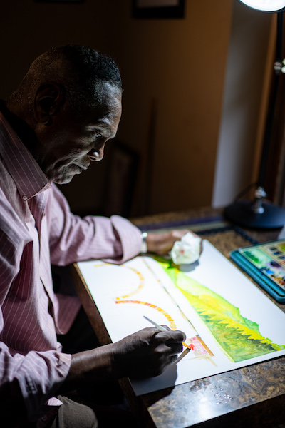 Richard Phillips working on a watercolor painting