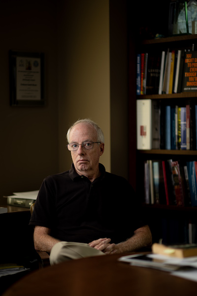 David Moran sits in his office