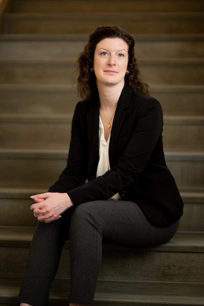 Elizabeth Cole sitting on courthouse steps