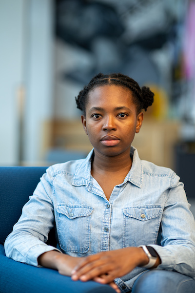 U-M law student Brittany Warren seated and wearing a denim shirt