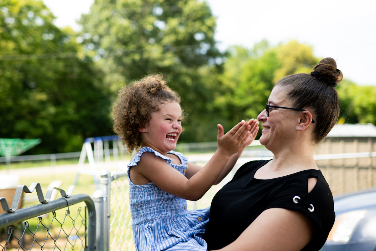 Tonia Miller sharing a moment with her happy young niece