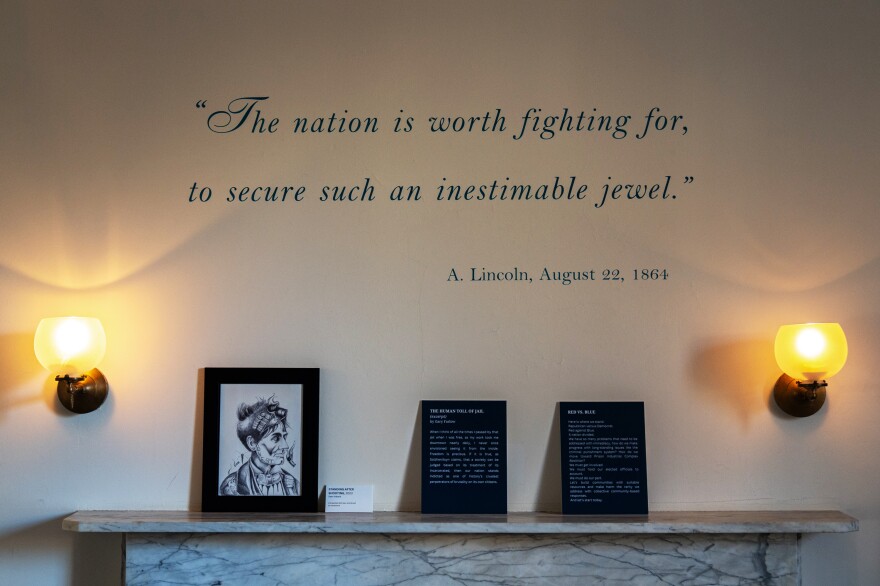 A portrait of President Abraham Lincoln sits on a mantel at Lincoln's Cottage.