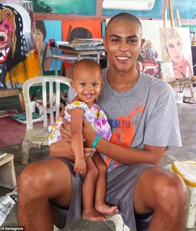 Mack's son Stella - whom she birthed serving her overseas sentence in Indonesian prison - is pictured here with her father, Tommy Schaefer. Mack said Stella, now seven, does not know why both her mother and father are imprisoned, and she wants to keep it that way