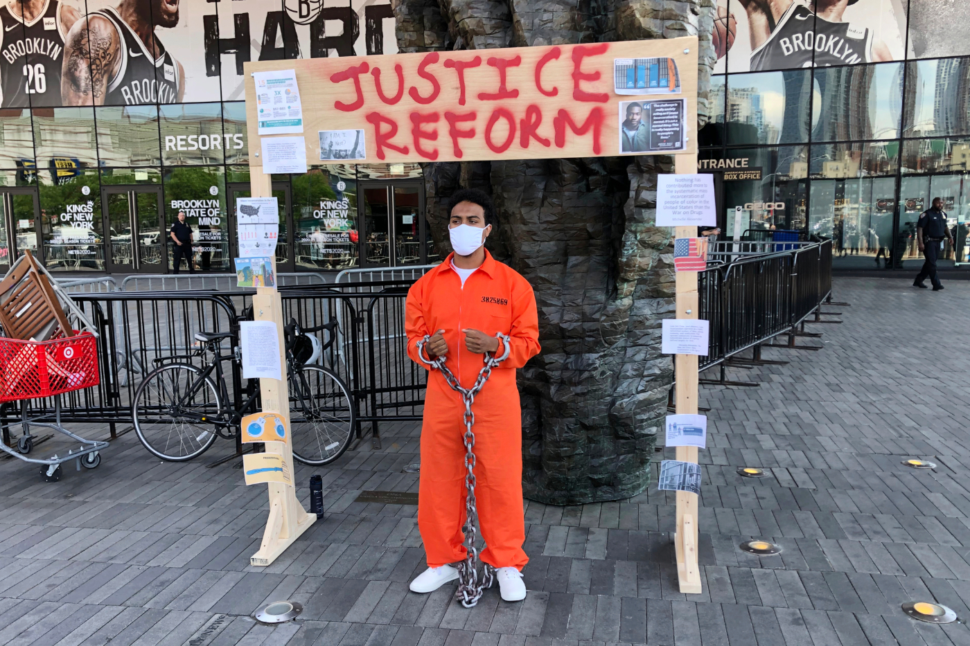 Ramón Guzman wears a prison jumpsuit and chains at a Juneteenth rally at the Barclay's Center in the borough of Brooklyn in New York City on Friday, June 19, 2020.