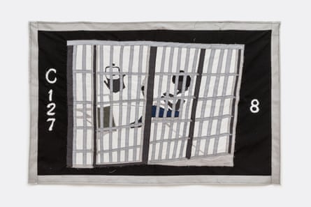 a quilt showing a prison cell