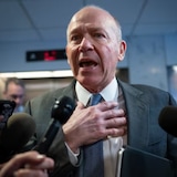 Boeing CEO Dave Calhoun speaks briefly with reporters after a meeting at the U.S. Capitol in Washington on Jan. 24. Calhoun will step down from the embattled plane-maker at the end of the year after a series of mishaps at one of America's most storied manufacturers.