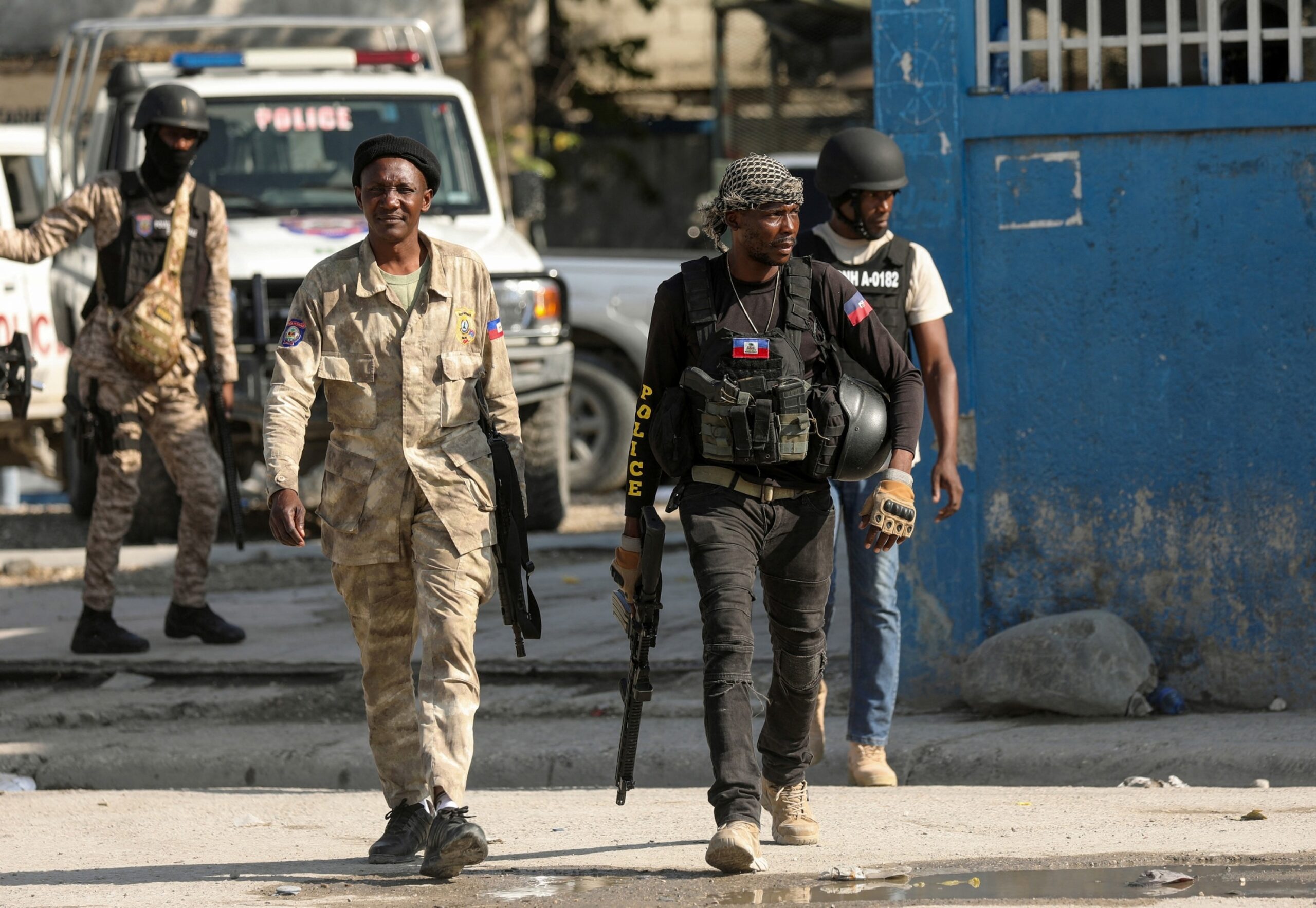 PHOTO: Police officers patrol outside the police headquarters as Haiti continues in a state of emergency, in Port-au-Prince, Haiti, on March 6, 2024. 