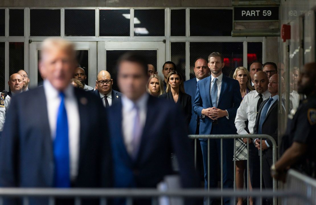 NEW YORK, NEW YORK - MAY 30: Eric Trump (4th-R) listens as former U.S. President Donald Trump speaks to the media after being found guilty on all 34 counts in his hush money trial at Manhattan Criminal Court on May 30, 2024 in New York City. The former president was found guilty on all 34 felony counts of falsifying business records in the first of his criminal cases to go to trial. Trump has now become the first former U.S. president to be convicted of felony crimes. (Photo by Justin Lane-Pool/Getty Images)