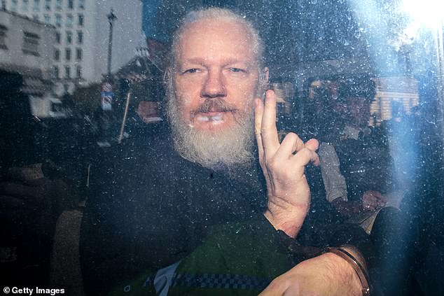 In the agreement, prosecutors will look for a 62-month sentence - the same amount of time Assange has served in a high-security prison in London while fighting extradition to the U.S. Assange is pictured in April 2019