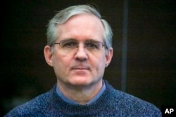 Paul Whelan, a former U.S. Marine, shown in a Moscow court as he listens to his guilty verdict on June 15, 2020.