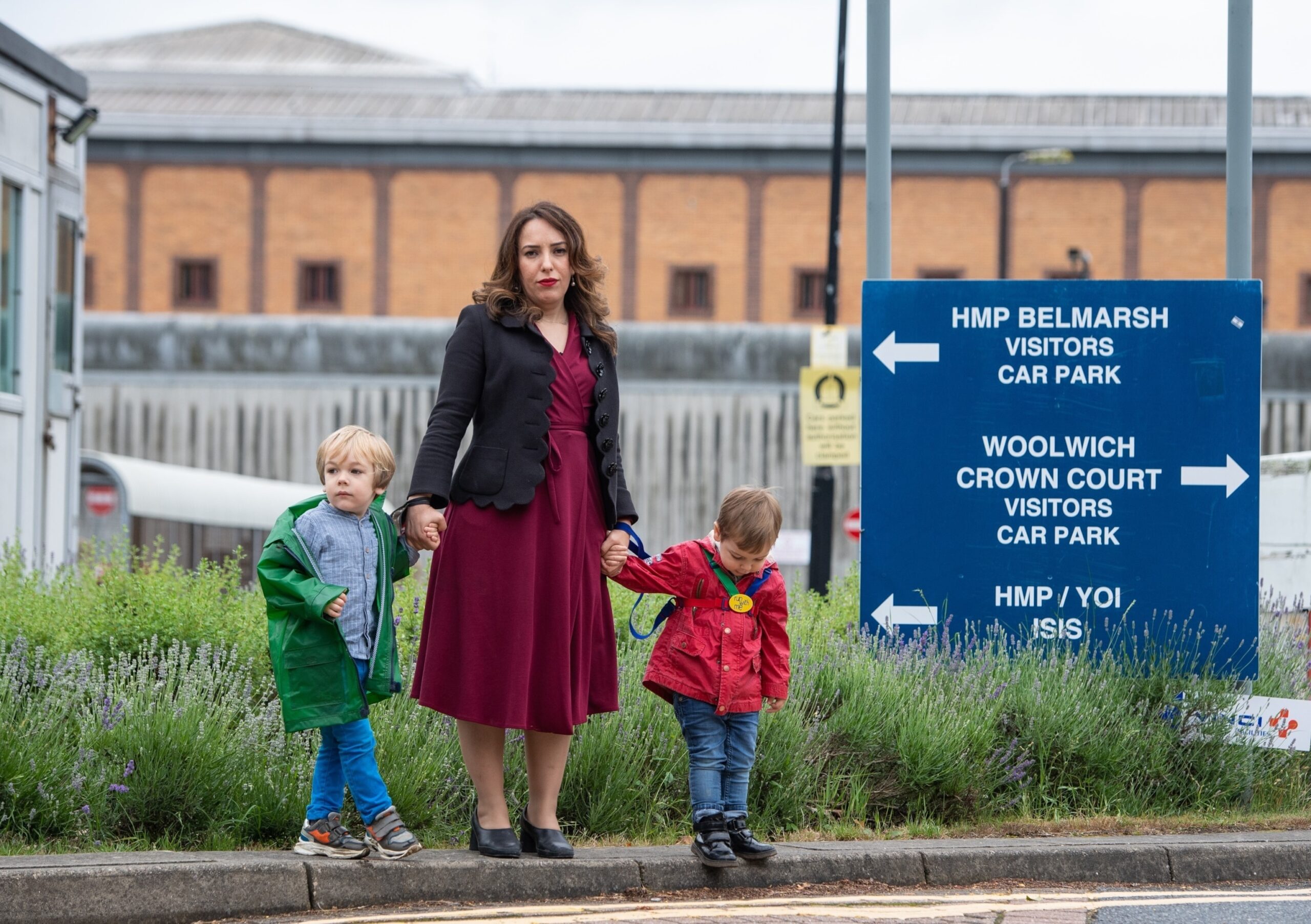 PHOTO: Stella Moris stands with her children Gabriel, four, (left) and Max, two, outside Belmarsh Prison, London, following a visit to her partner and their father Julian Assange, June 19, 2021.